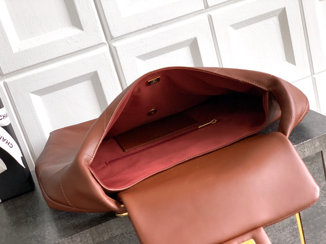 ** Burgundy Leather Hobo Bag with Gold Chain - Stylish & Versatile

**