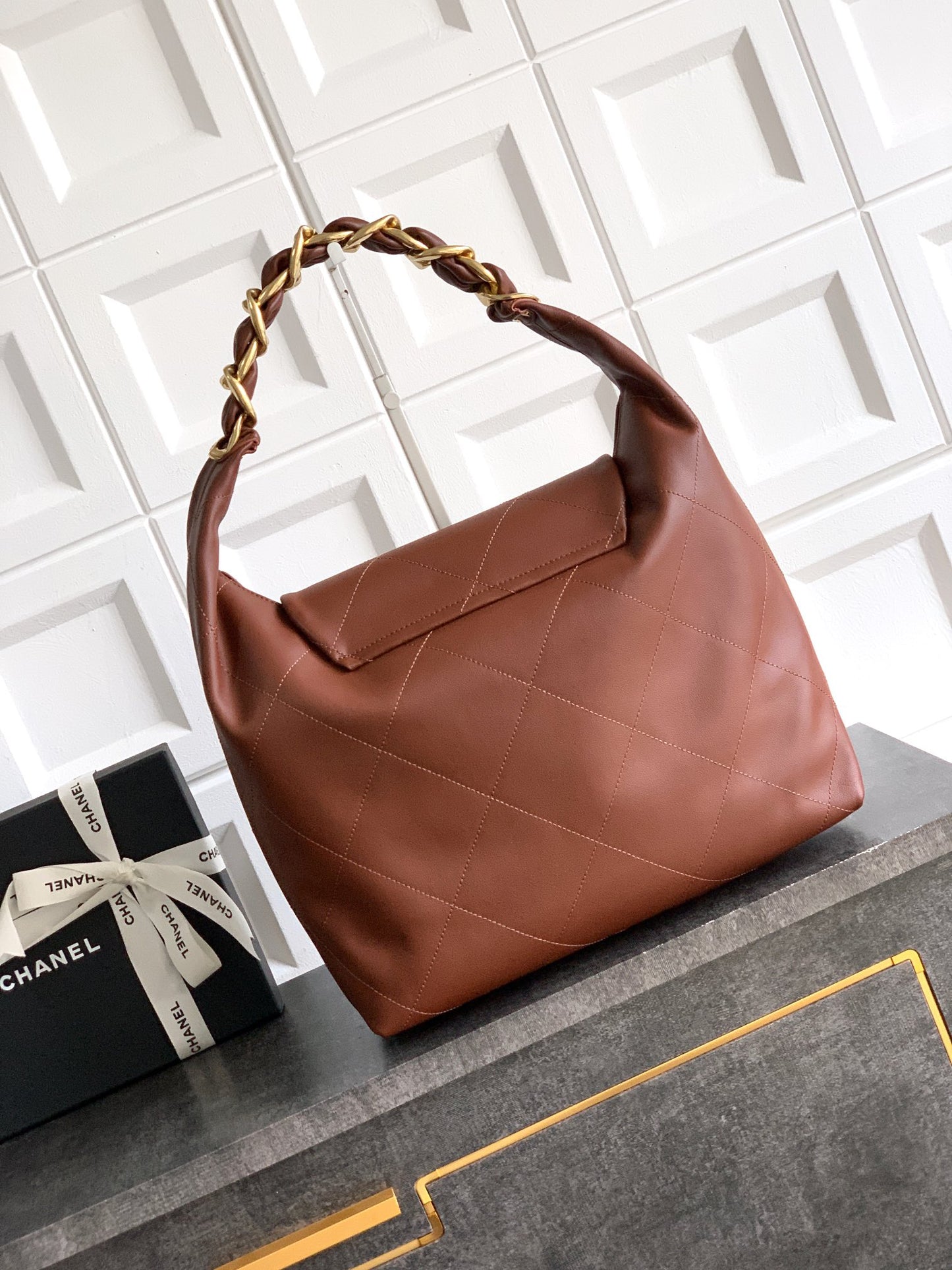 ** Burgundy Leather Hobo Bag with Gold Chain - Stylish & Versatile

**