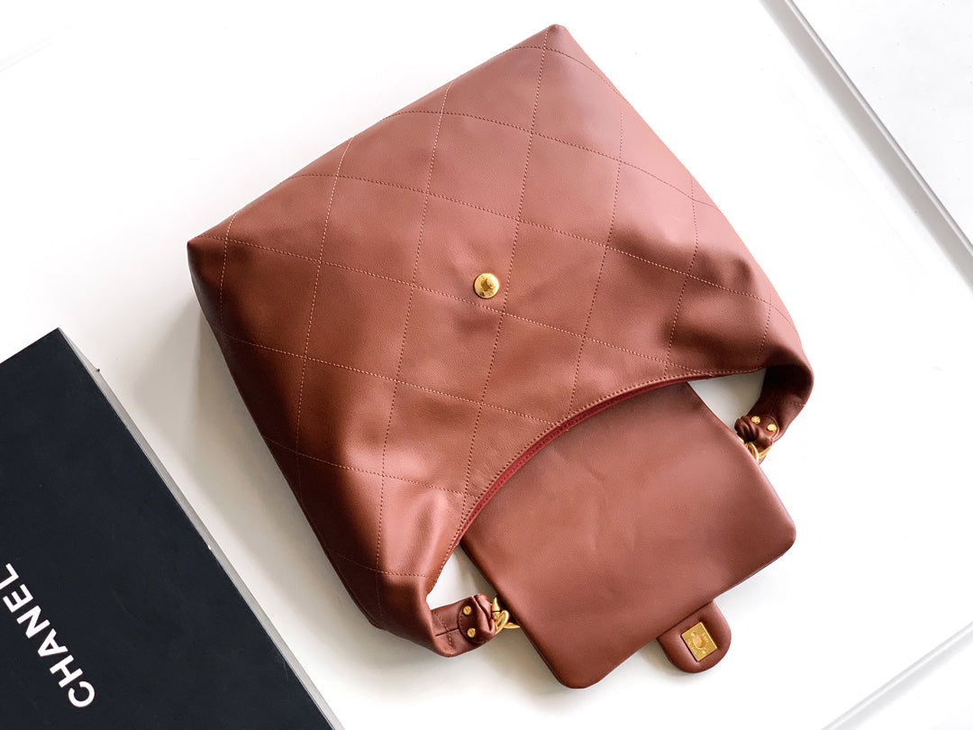 ** Burgundy Leather Hobo Bag with Gold Chain - Stylish & Versatile

**